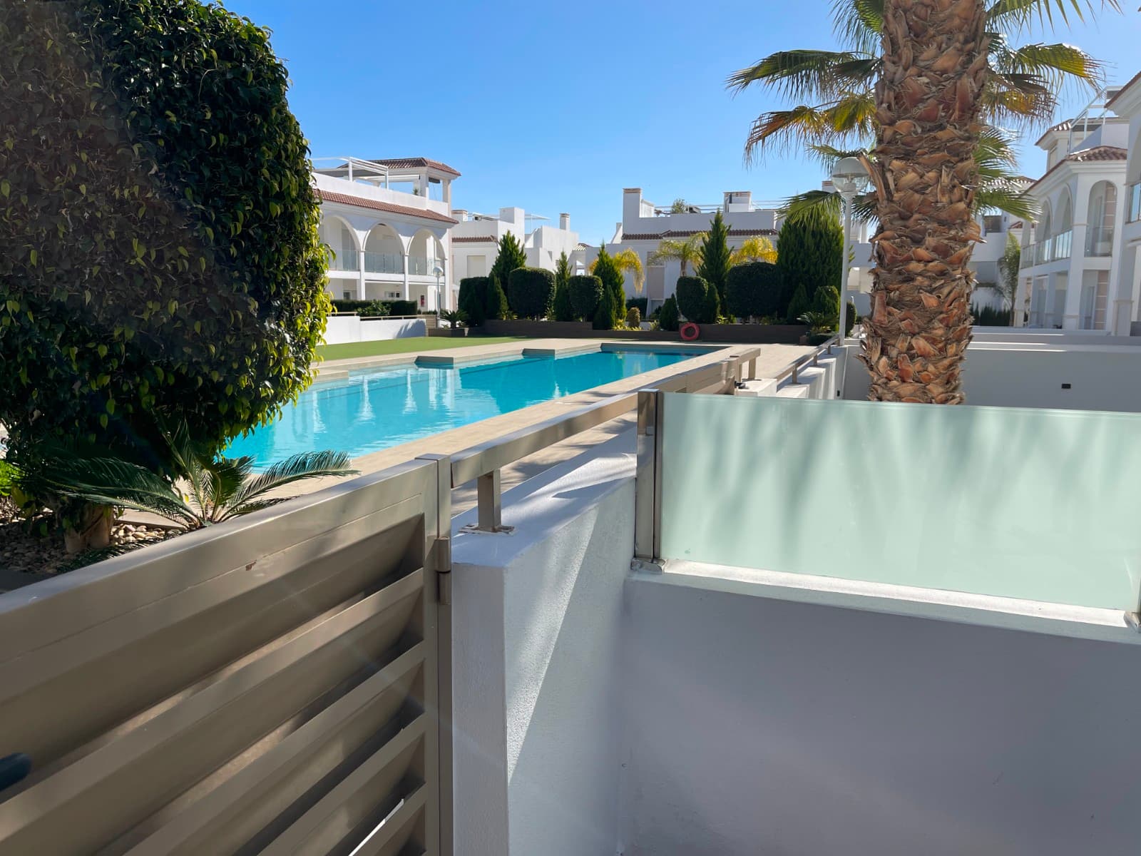 Gated residential complex of Mediterranean style flats with 2 bedrooms